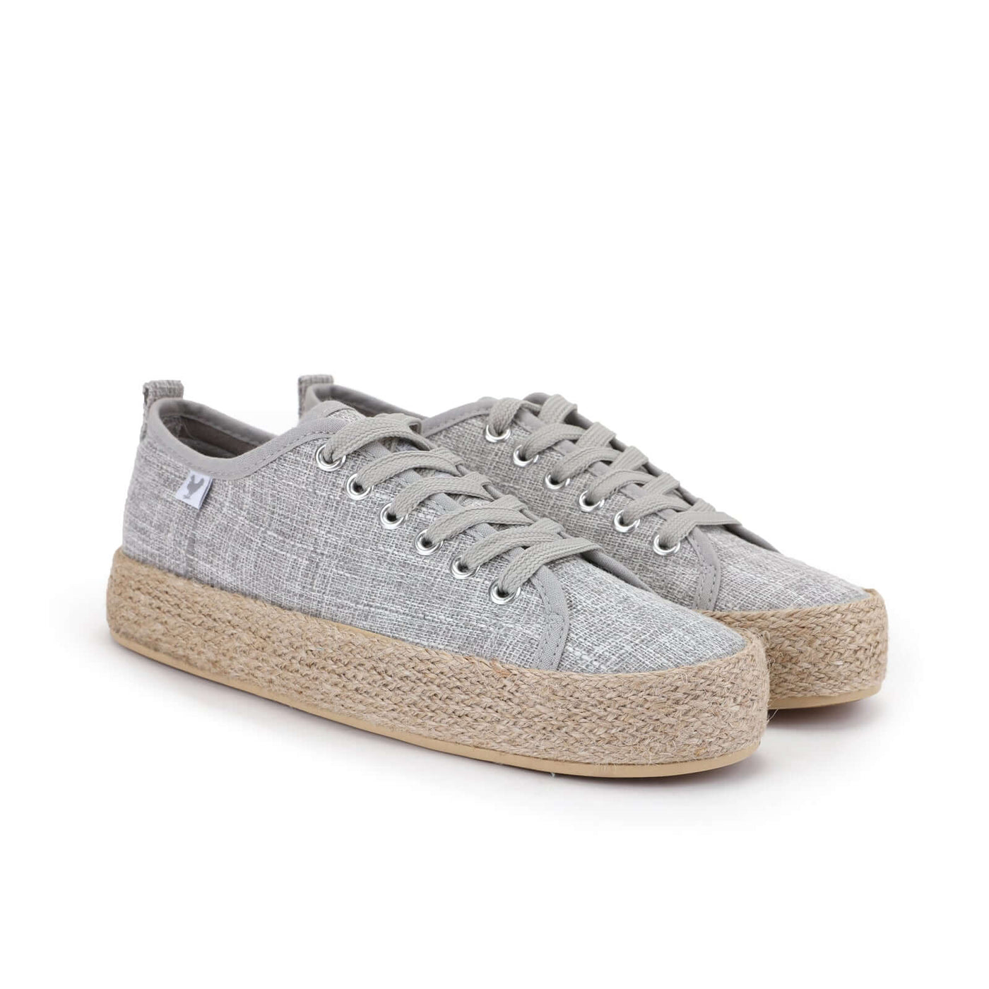 Grey linen lace-up espadrille sneakers with jute band and 4cm platform, embodying Mediterranean summer style and comfort.