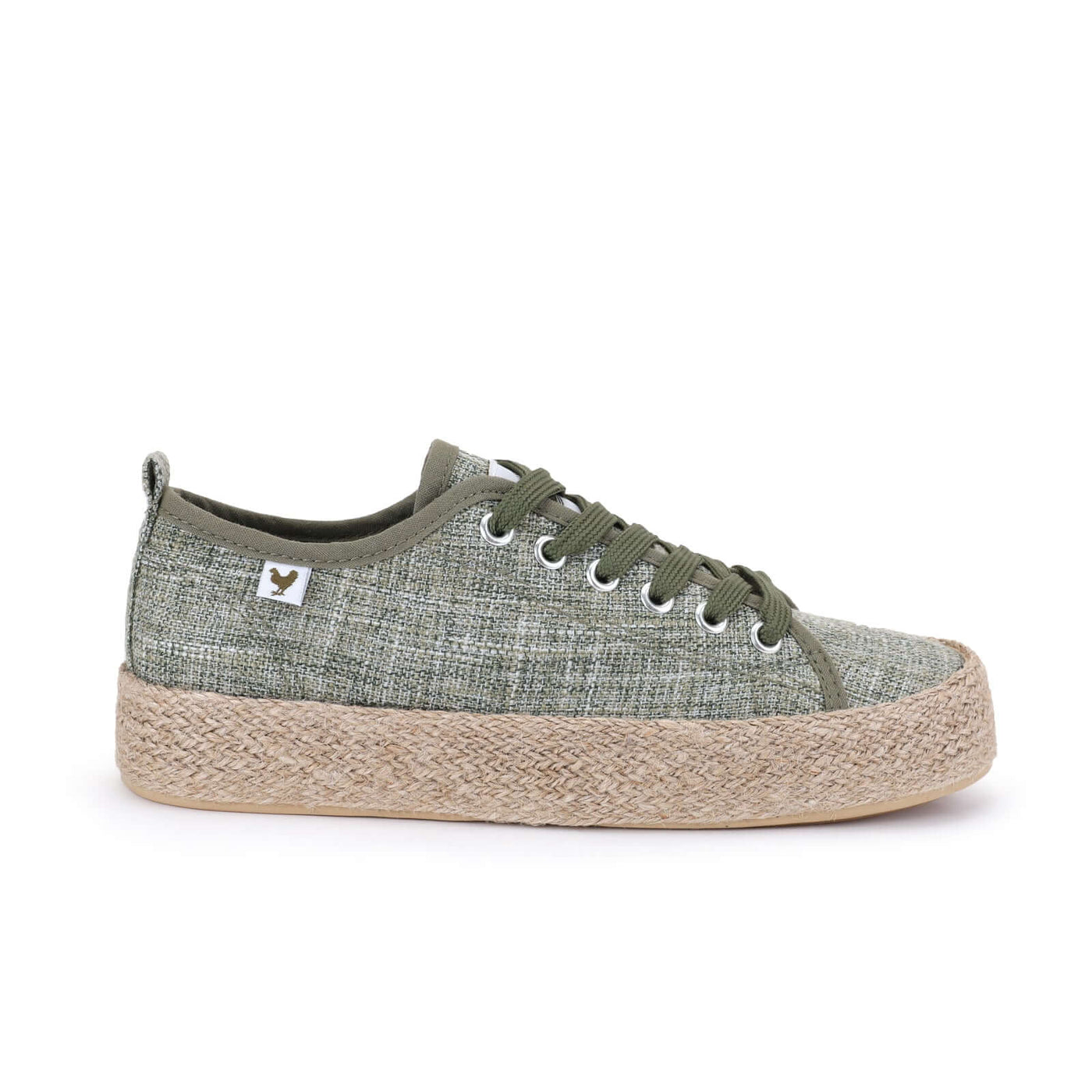 Olive green linen lace-up espadrille sneaker with jute platform and rubber sole, showcasing Mediterranean summer style.