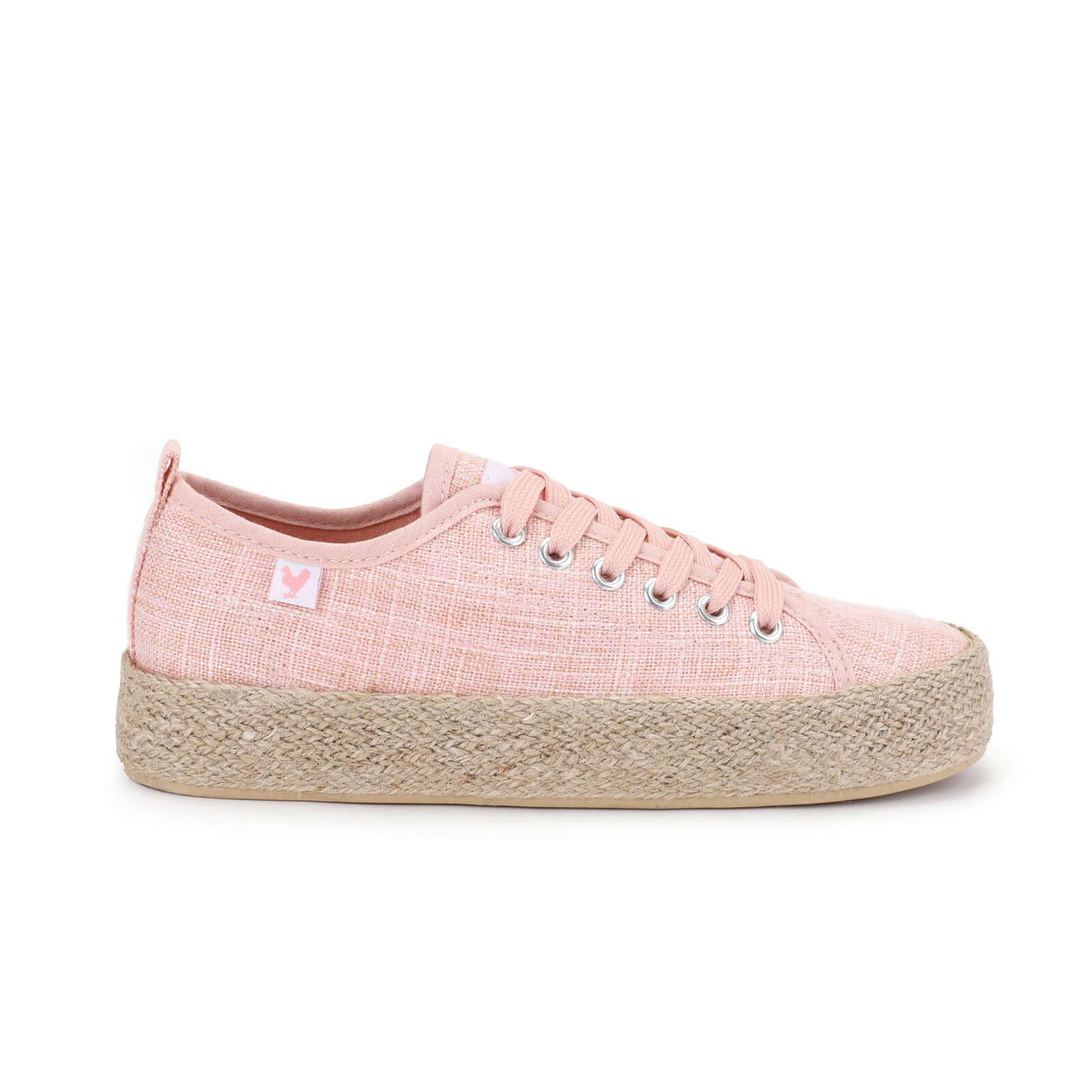 Pink linen lace-up espadrille sneaker with jute platform and rubber sole, embodying vibrant Spanish summer style.