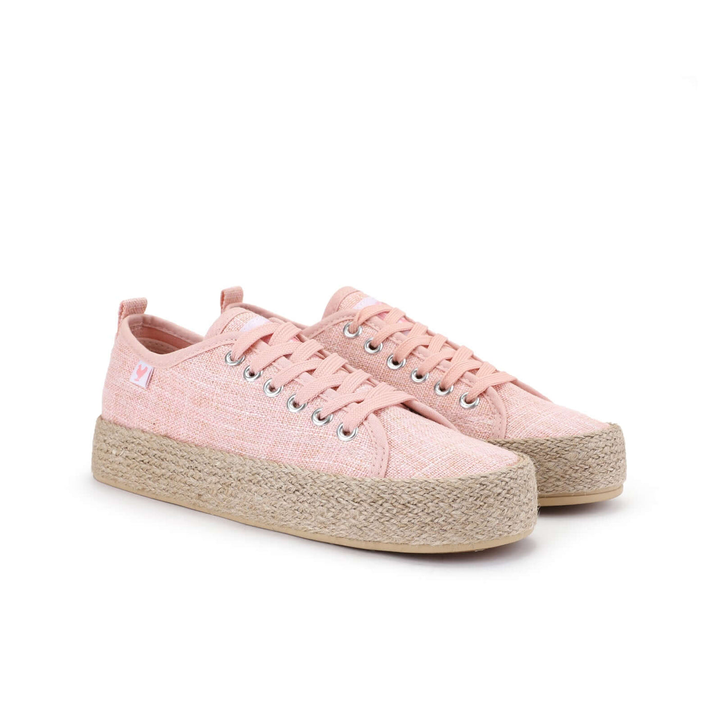 Pink linen lace-up espadrille sneakers with jute platform and canvas upper, offering a vibrant summer style and Mediterranean vibe.