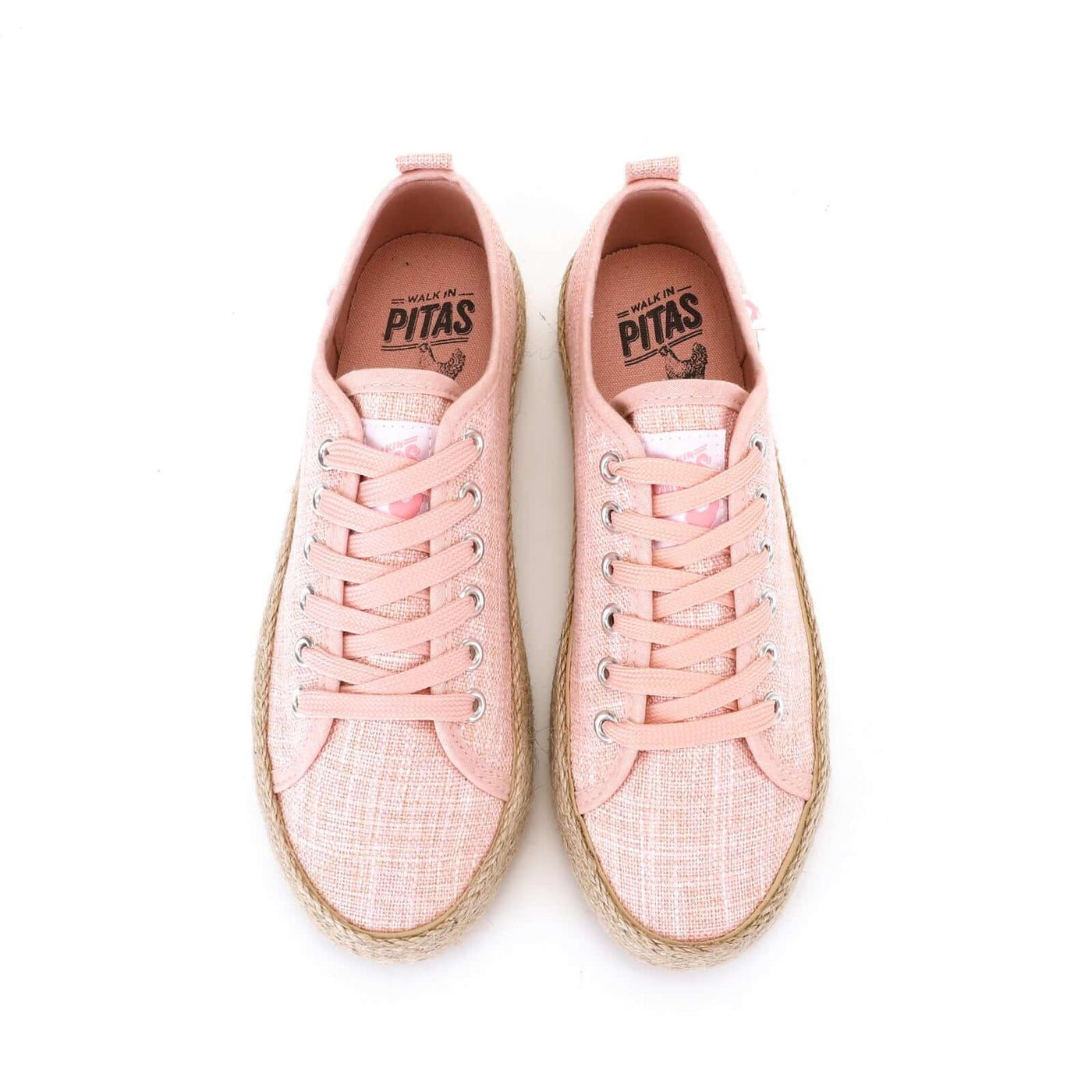 Pink linen lace-up espadrille sneakers with jute band and rubber sole, showcasing Mediterranean summer style and comfort.