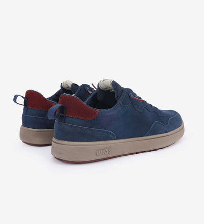 Kume Sneakers by Pitas in blue suede with red accents, showcasing water-repellent features and easy-on laces for comfort and style.