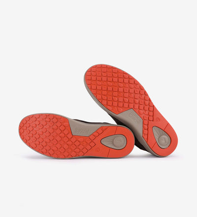 Red sole of Kume Sneakers by Pitas, showcasing texture grip and durable design for active wear.