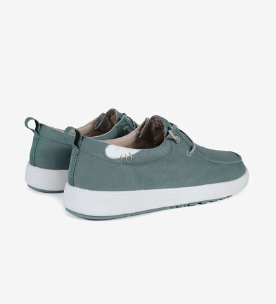 Green Biarritz Hi-Grip Wally shoes with easy-on elastic laces, cotton canvas upper, supportive heel, and EVA sole.