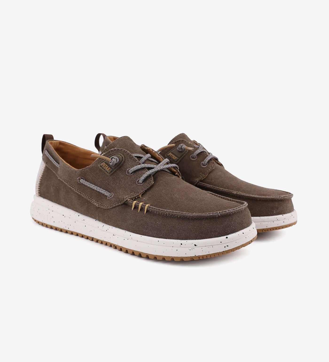 Byron ultralight boat shoes with elastic laces, 100% cotton canvas, breathable lining, and shock absorbent EVA sole.