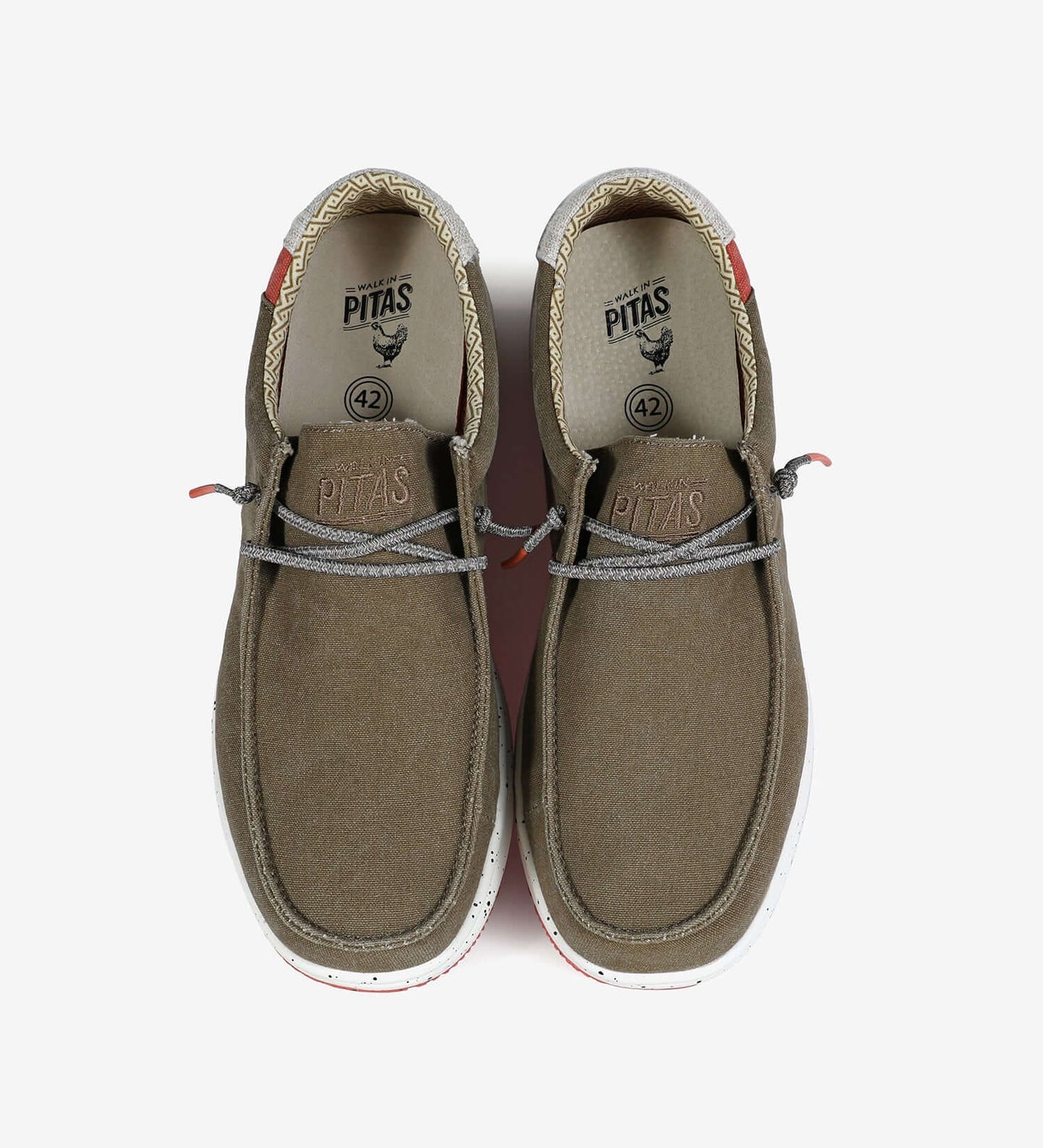 Nias Ultralight Wally boat shoes with easy-on elastic laces, cotton upper, and EVA sole for comfort and grip.