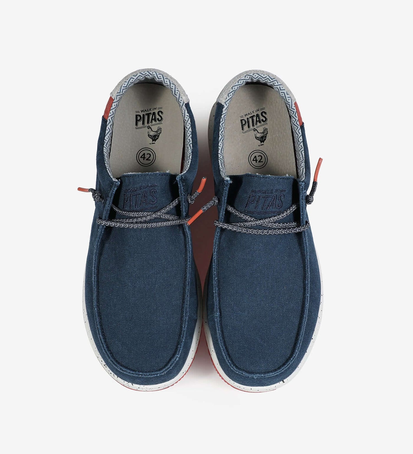 Nias Ultralight Wally boat shoes with easy-on elastic laces, blue cotton upper, and color contrast rubber outsole.