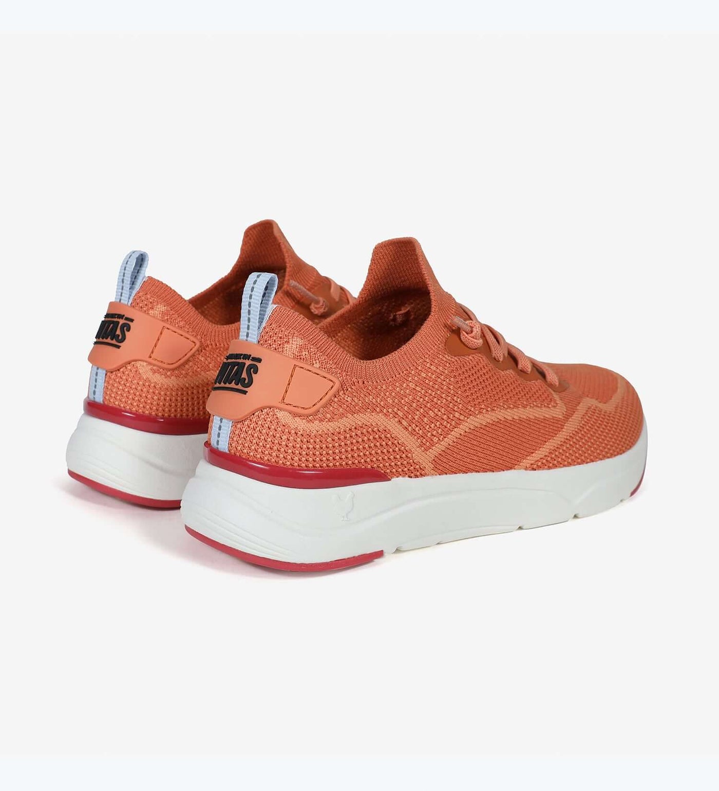 Women's orange mesh sneakers with pull-on heel loops and white EVA sole, featuring Cue memory foam by Pitas for comfort.