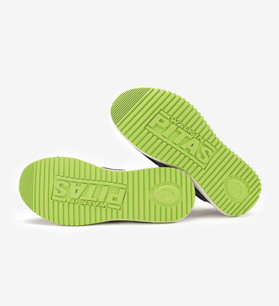 Ultralight Hive Wally lime green rubber outsole with high-grip texture and Pitas branding, showcasing durable slip-resistant design.