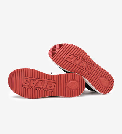 Red non-slip rubber outsoles of Bones Ultralight Loafers, showcasing grip and durability.