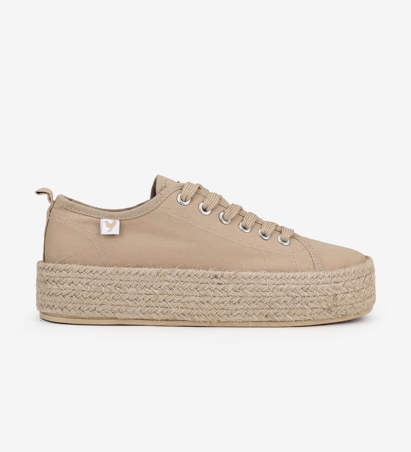 Beige canvas lace-up espadrille sneakers with 4cm platform and jute band, exuding Mediterranean summer style and comfort.