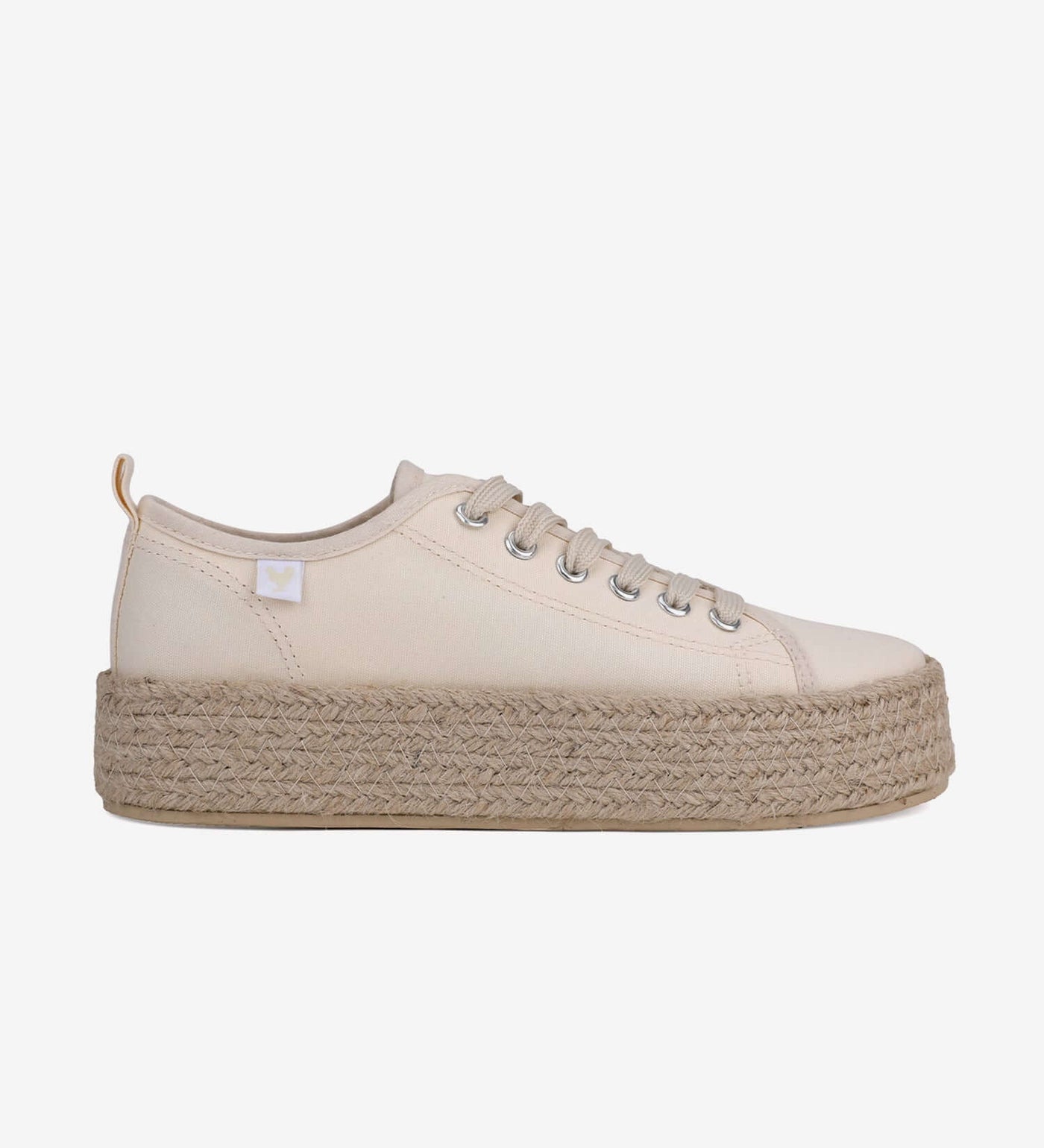 Beige lace-up espadrille sneakers with 4cm jute platform and linen upper, perfect for a comfortable Mediterranean summer vibe.