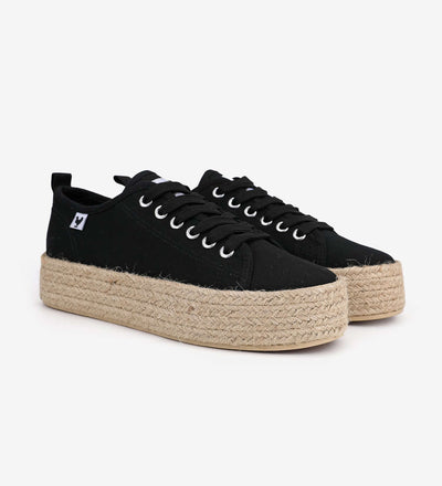 Black canvas lace-up platform espadrille sneakers with jute band and rubber sole, showcasing vibrant Spanish summer style.