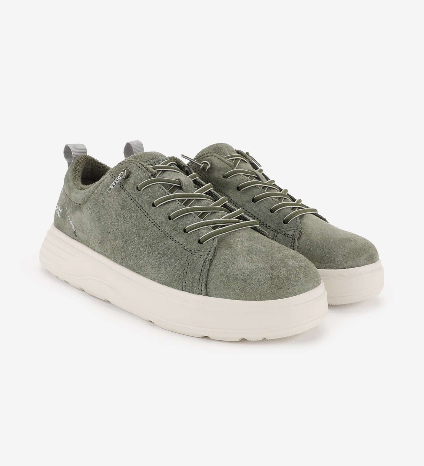 Green Yari suede sneakers by Pitas, featuring water-repellent material, easy-on elastic laces, and a lightweight, breathable design.